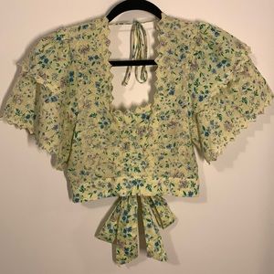 Yellow floral open back crop top